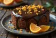 盛り付けられたチョコレートとオレンジのケーキ